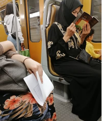 Person reading a missionary book