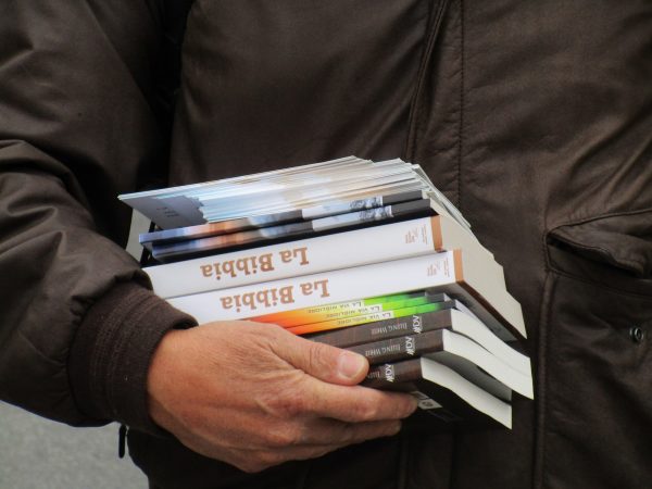 Missionary books being distributed